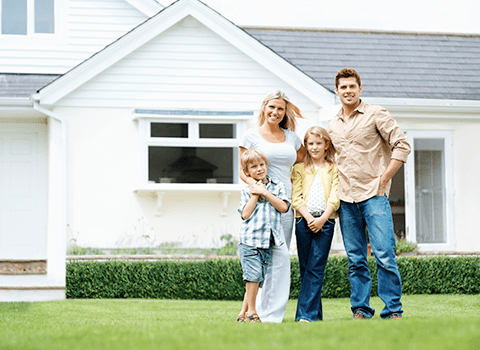 family-in-front-of-latham-ny-home